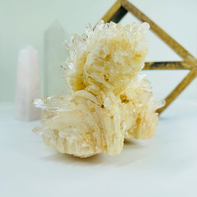 lemurian quartz with decorations in the background