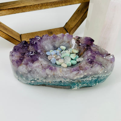 amethyst bowl with decorations in the background