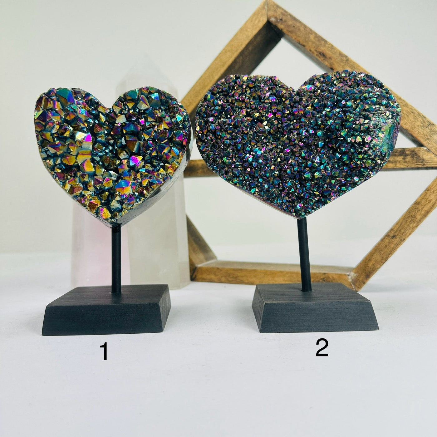 titanium coated heart on stand with decorations in the background