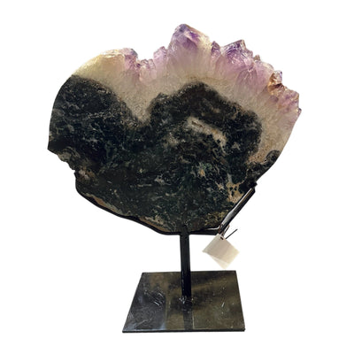 amethyst with jasper on metal stand on white background