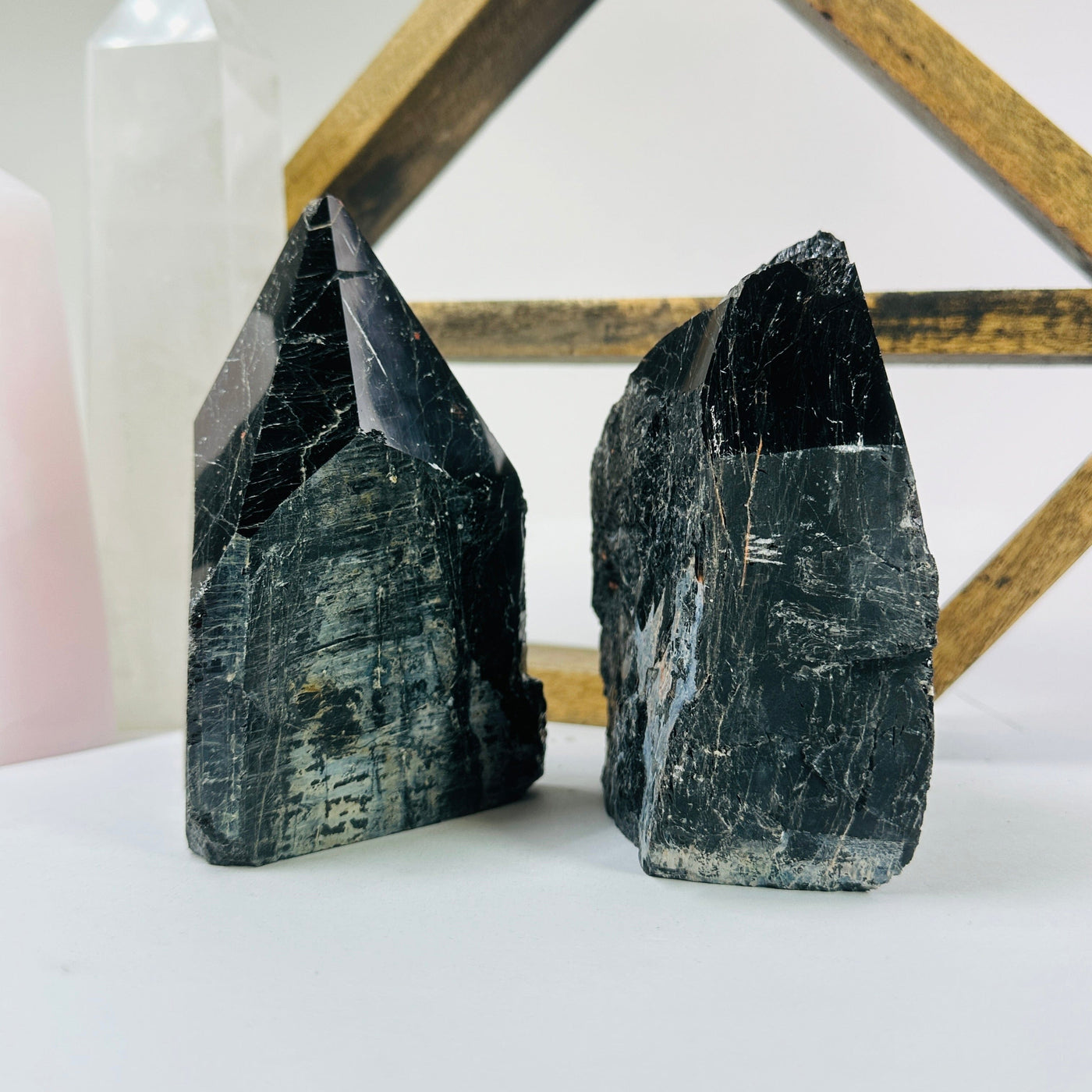 tourmaline points with decorations in the background