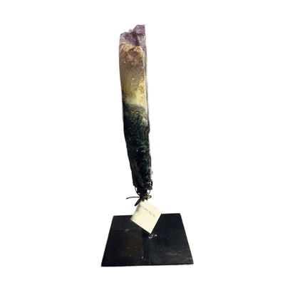 amethyst with jasper on metal stand on white background