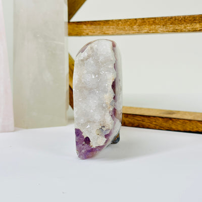 amethyst with decorations in  the background