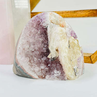 amethyst cut base with decorations in the background