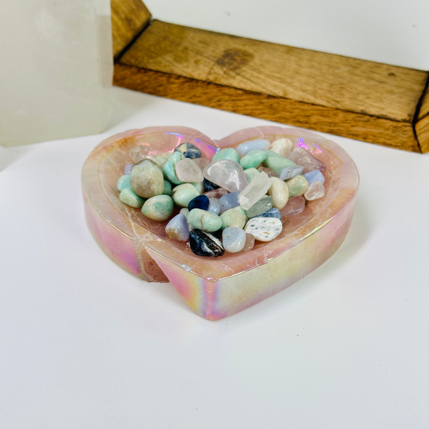 rose quartz bowl with decorations in the background