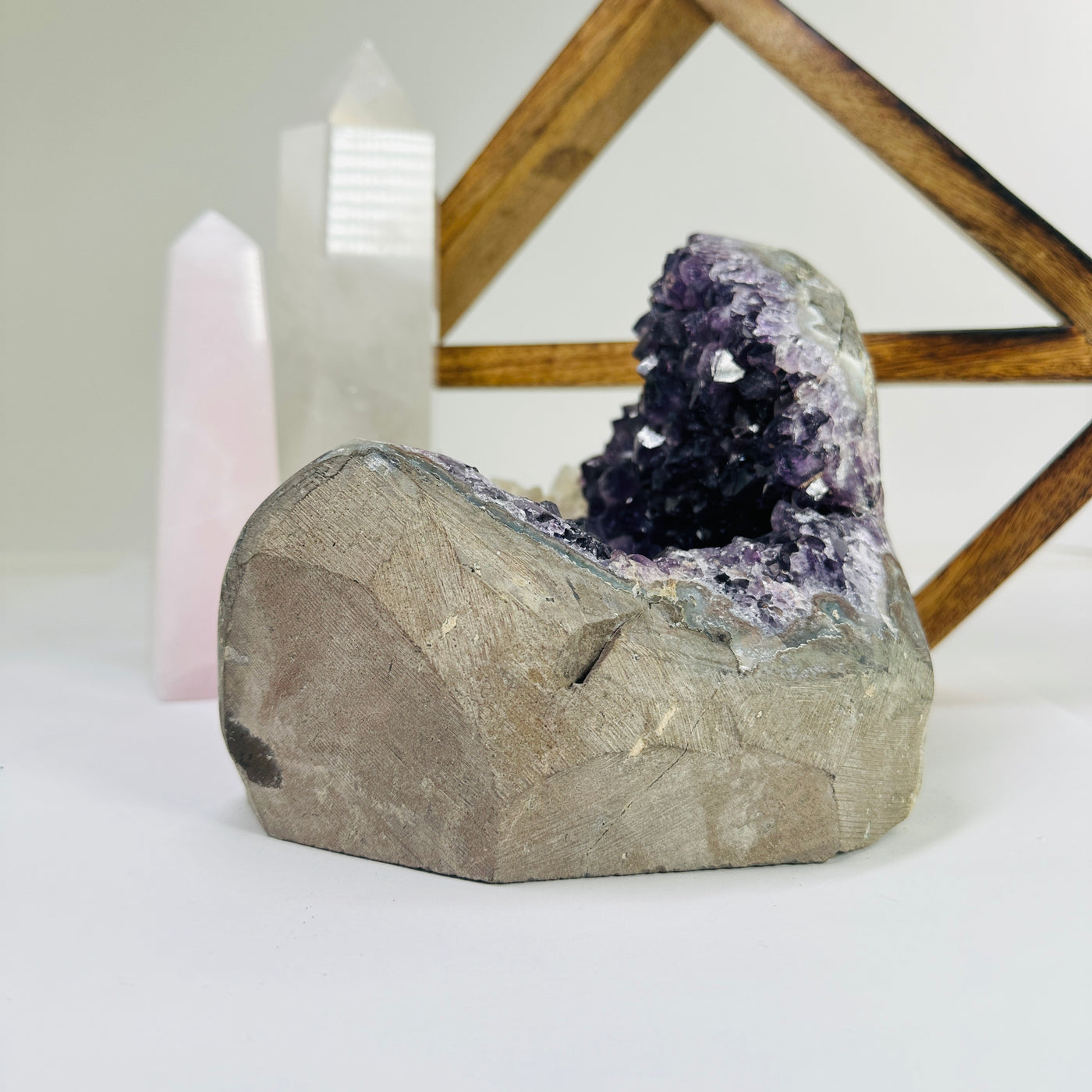 amethyst cut base with decorations in the background