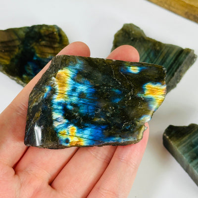 labradorite with decorations in the background