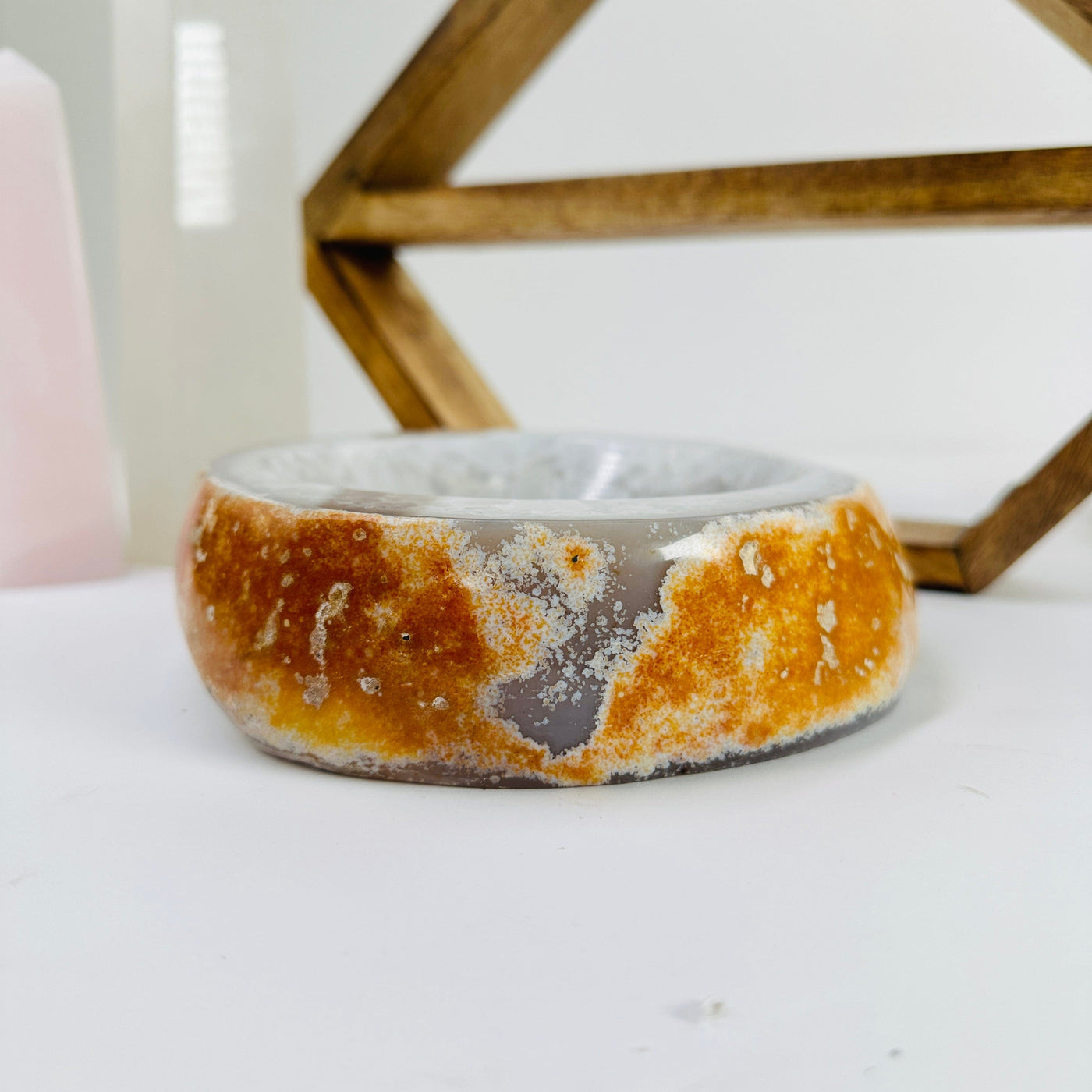 agate bowl with decorations in the background