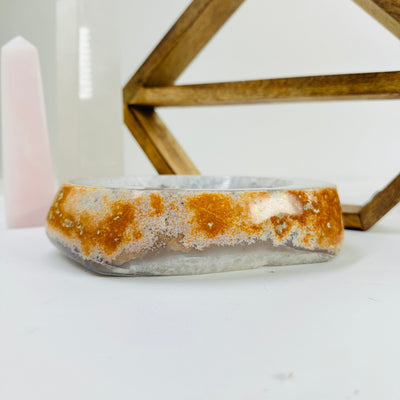 agate bowl with decorations in the background