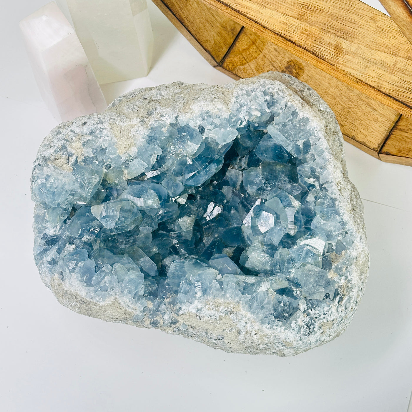 Celestite with decorations in the background