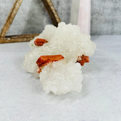 apophyllite with stilbite cluster with decorations in the background