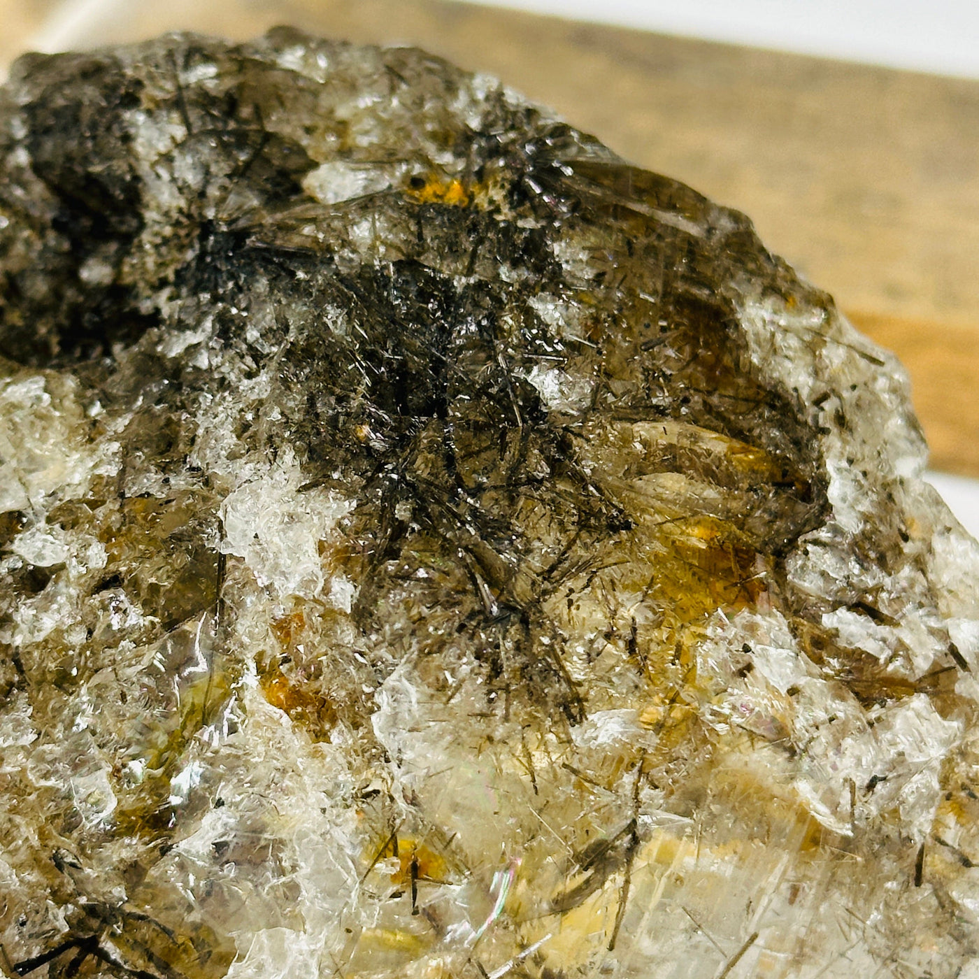 rutile quartz with decorations in the background