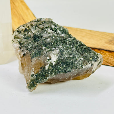 tourmaline with decorations in the background