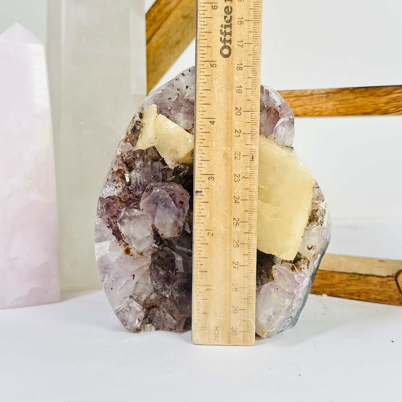 amethyst cut base next to a ruler for size reference