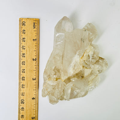 crystal quartz with decorations in the background