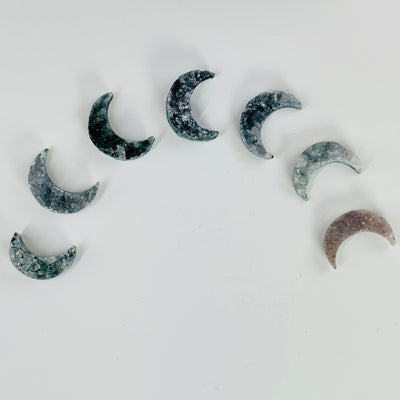 amethyst druzy moons on white background