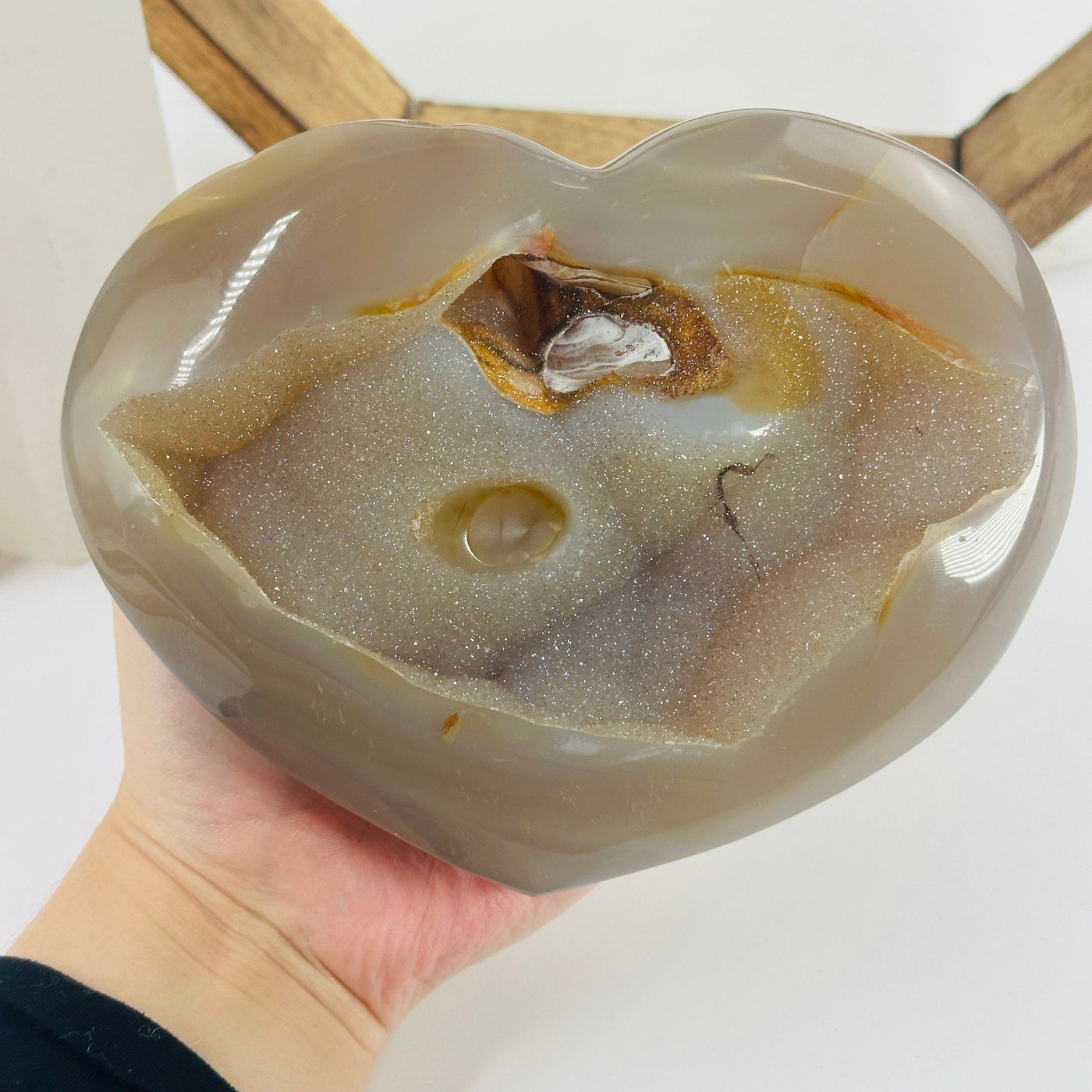 agate heart with decorations in the background