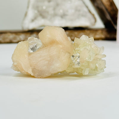 apophyllite with stilbite with decorations in the background