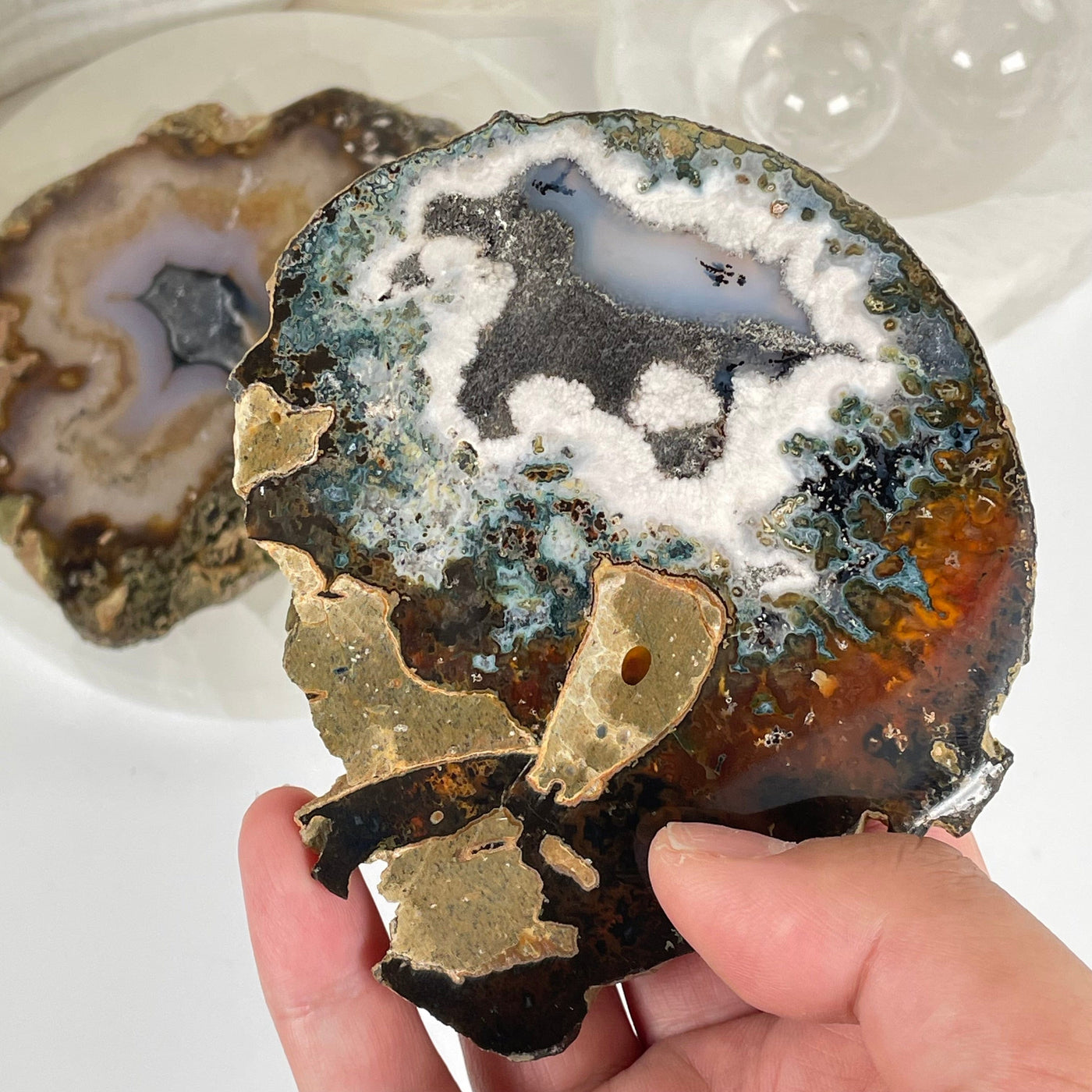 Scenic Moss Agate Crystal Slice - You Choose one in hand for size reference with other variant in background