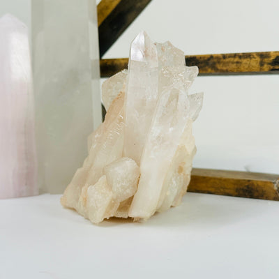 lemurian quartz with decorations in the background