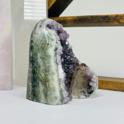 amethyst cut base with decorations in the background