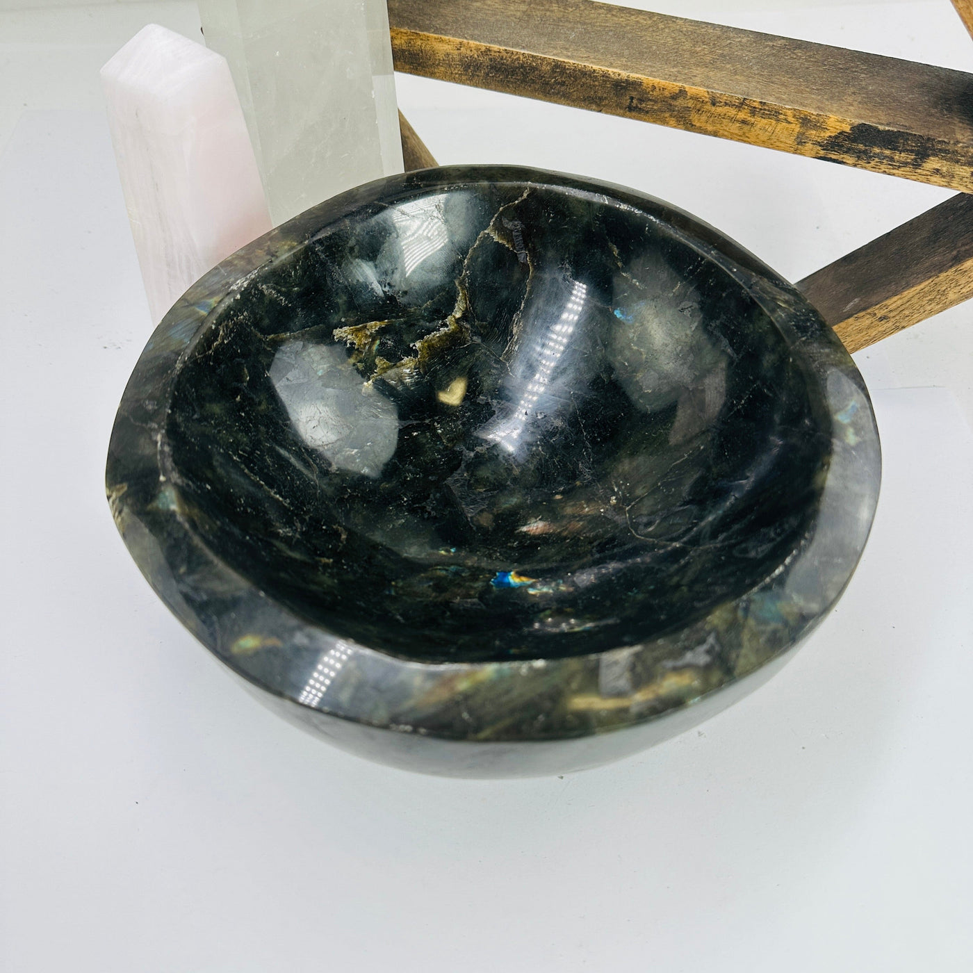 labradorite bowl with decorations in the background