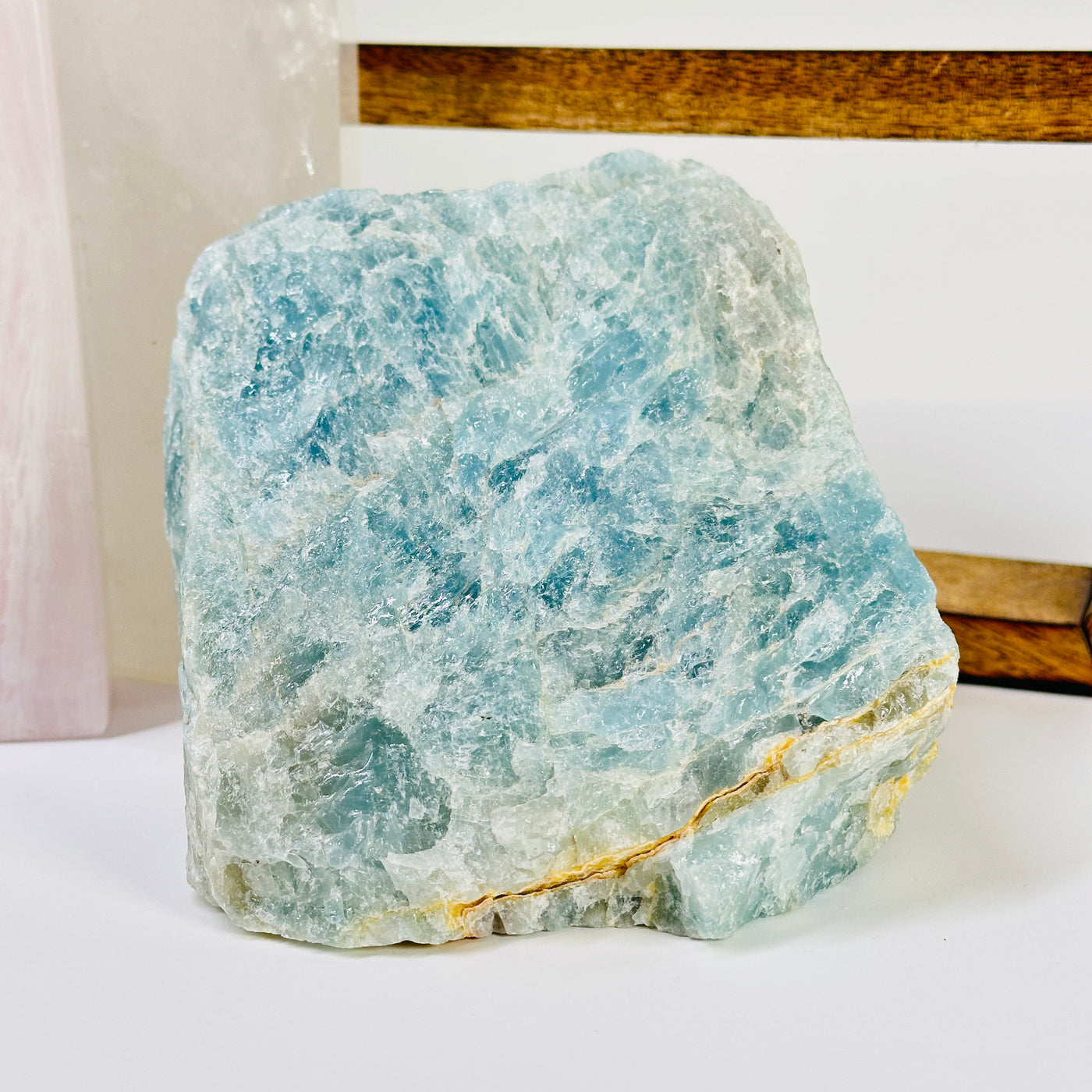 aquamarine with decorations in the background