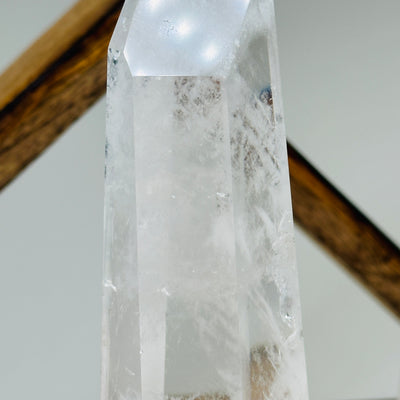 crystal quartz with decorations in the background