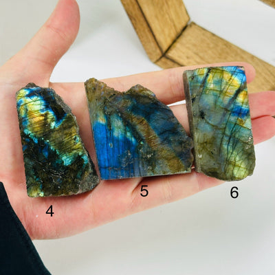 labradorite slab with decorations in the background