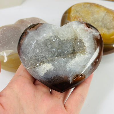 agate heart with decorations in the background