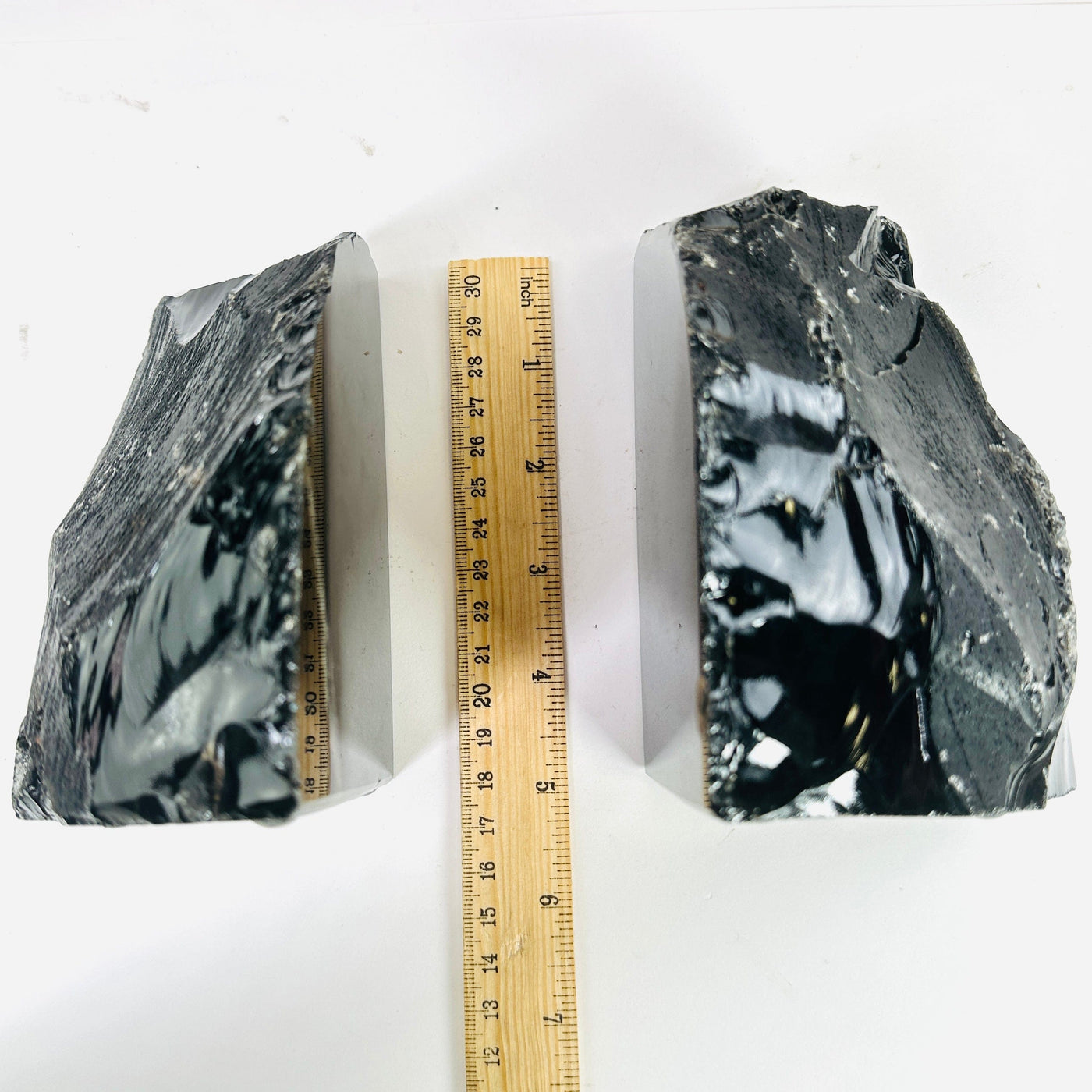 obsidian bookends with decorations in the background