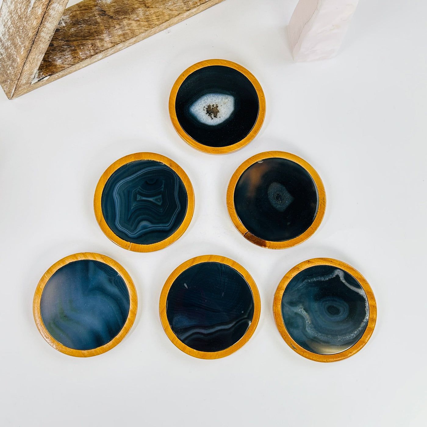 agate coasters with decorations in the background
