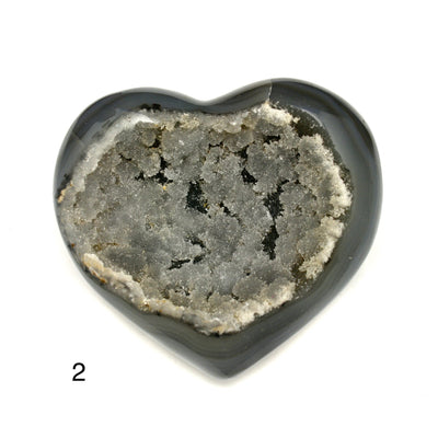 agate heart with decorations in the background