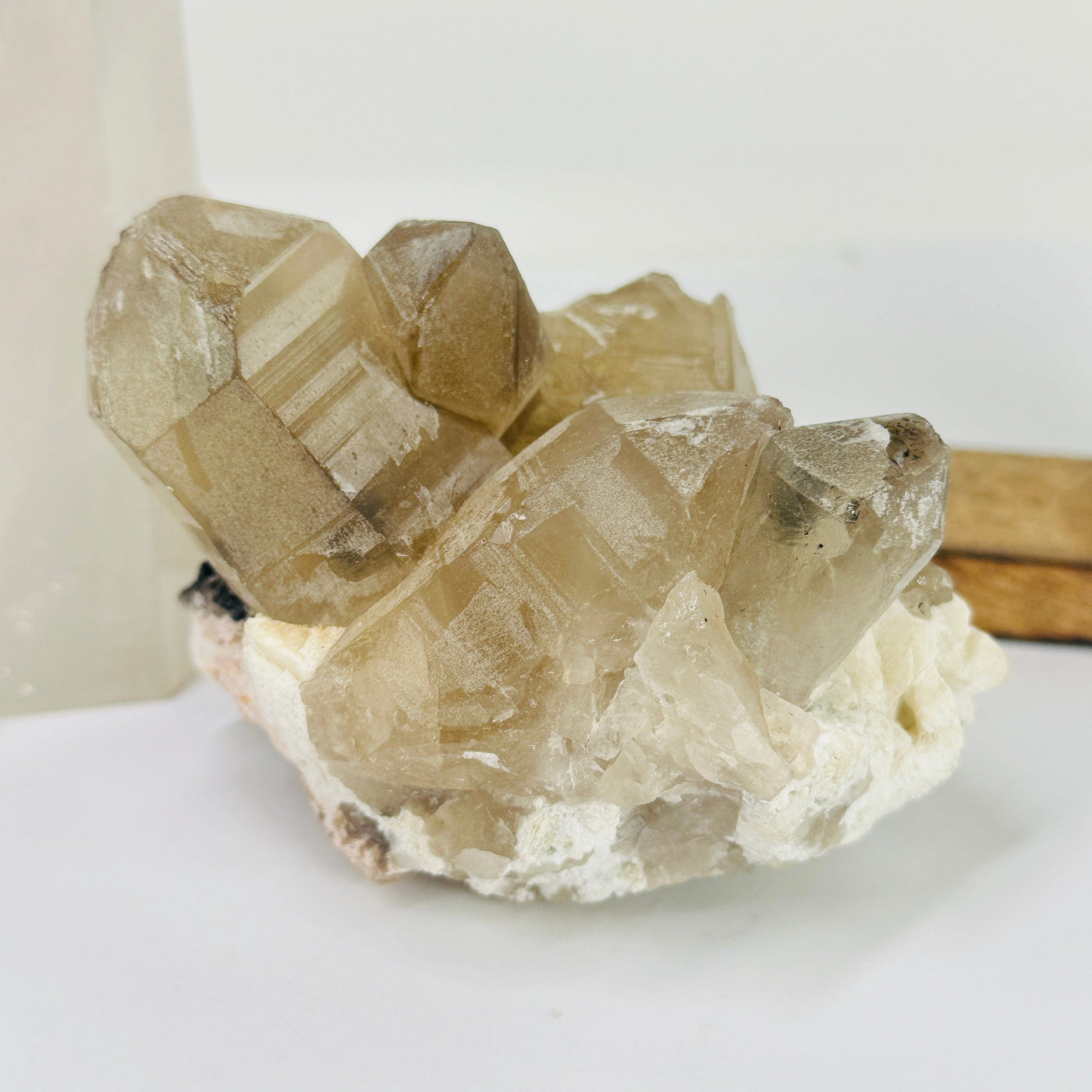 citrine with smokey quartz with decorations in the background