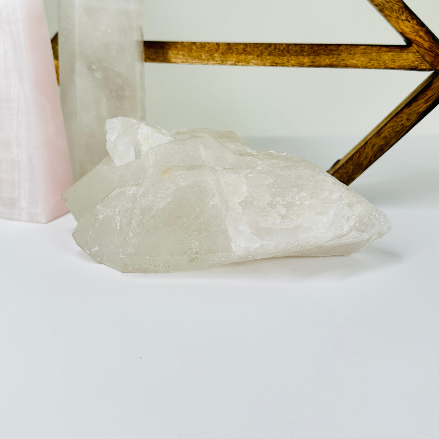 crystal quartz with decorations in  the background