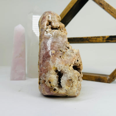 pink amethyst with decorations in the background