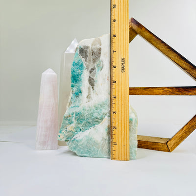 amazonite cut base next to a ruler for size reference