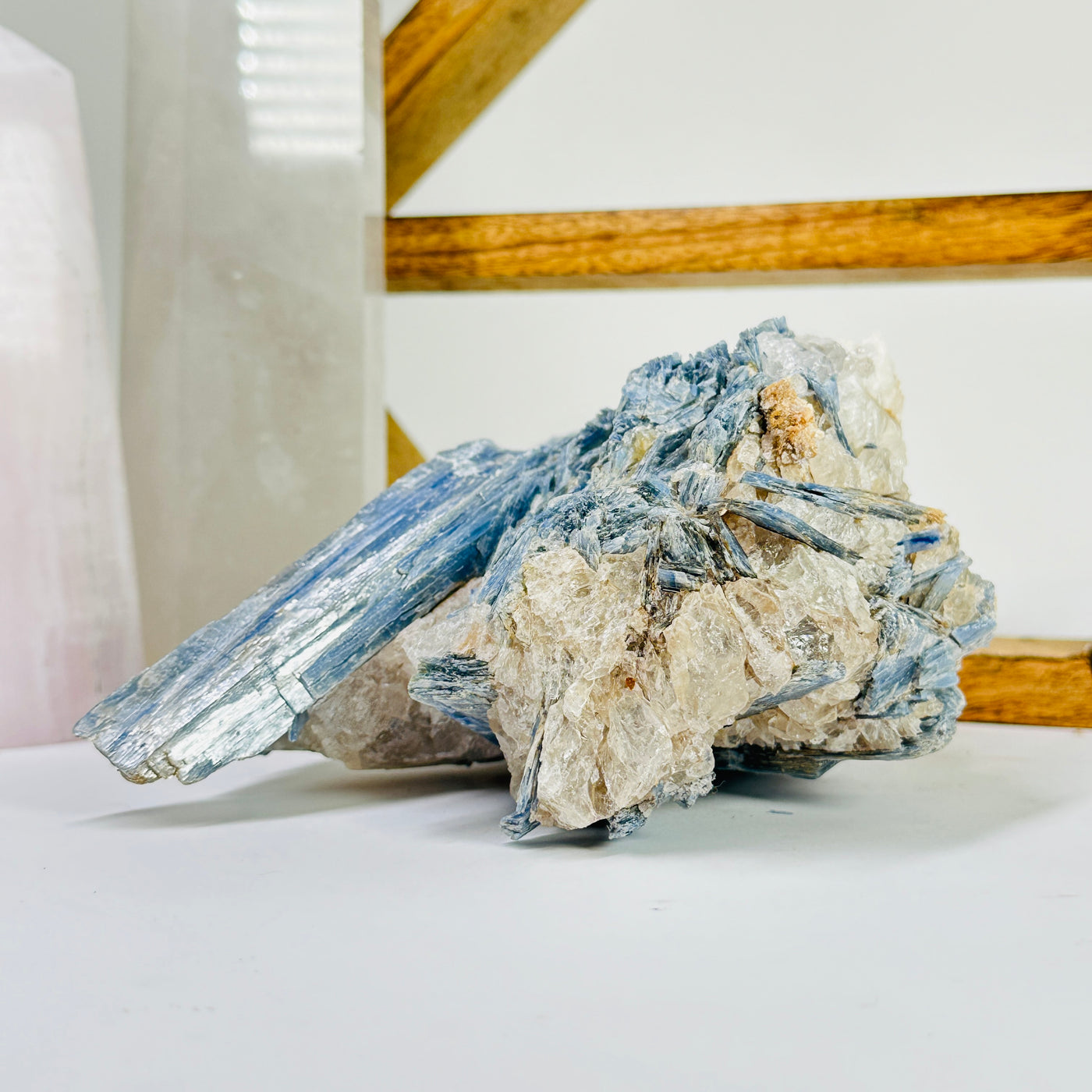 kyanite with decorations in the background