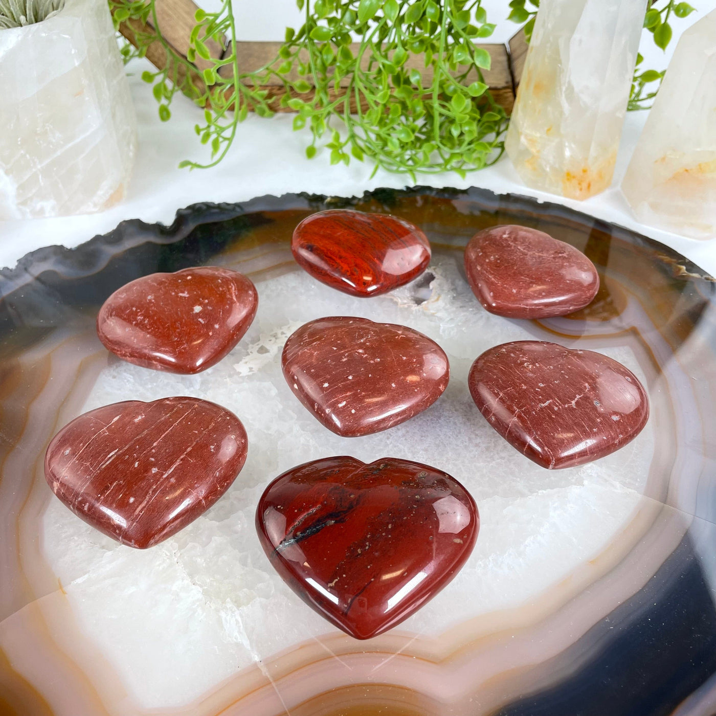 Red Jasper Crystal Heart - You Choose all variants side view on agate slice