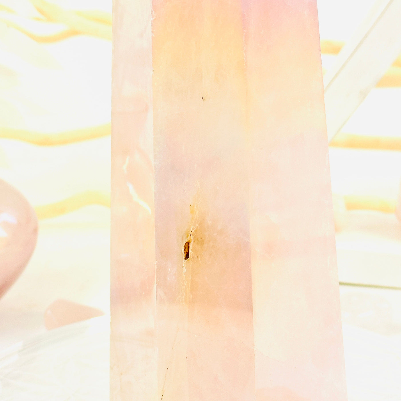 Angel Aura Rose Quartz Generator with Natural Inclusions closeup to show natural inclusion detail