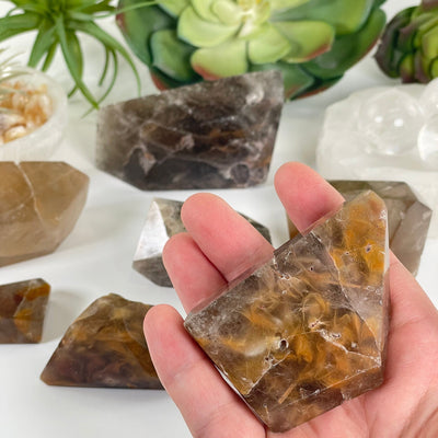 Amphibole Quartz Polished Freeform Crystal - As Is - You Choose one variant in hand for size reference with other variants in the background
