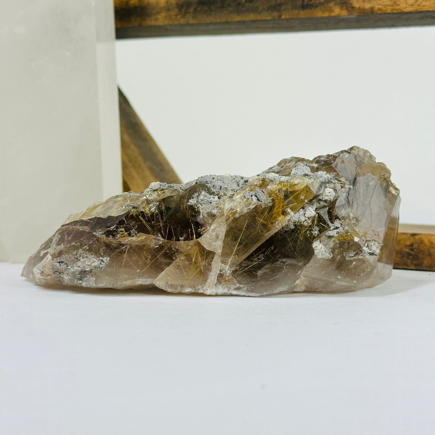 rutile quartz with decorations in the background