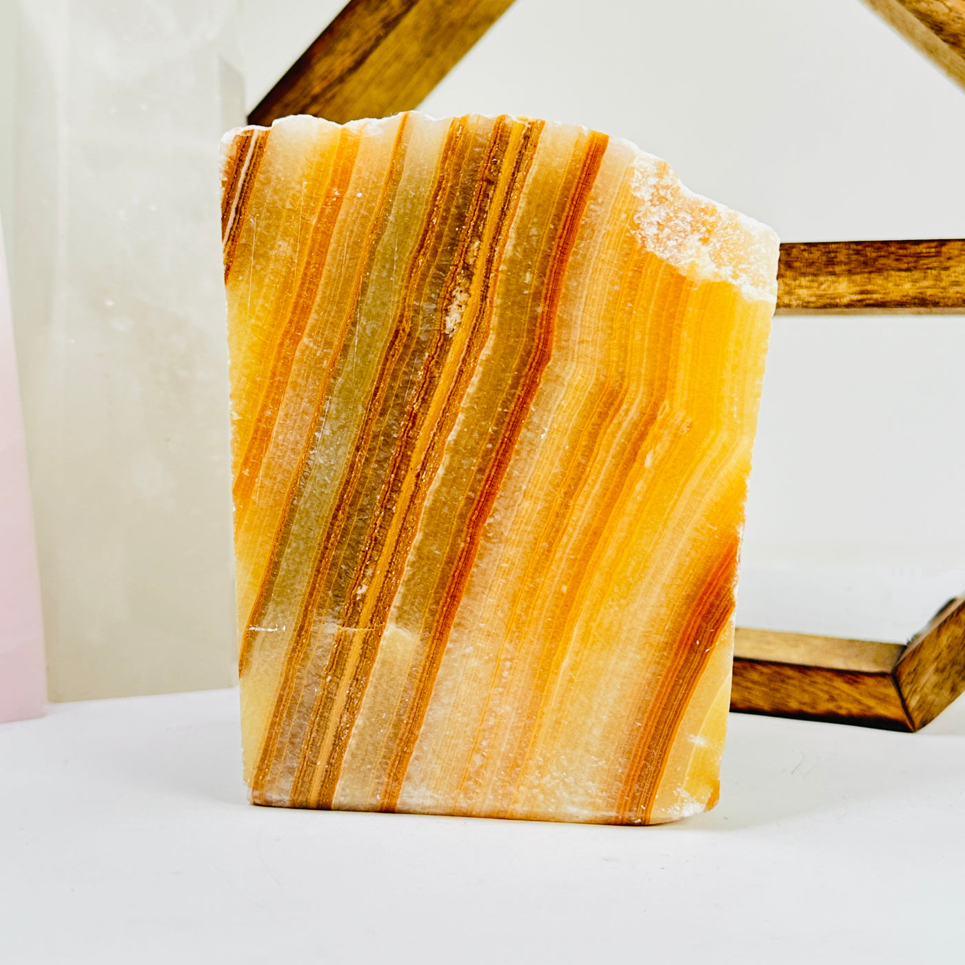 calcite cut base with decorations in the background