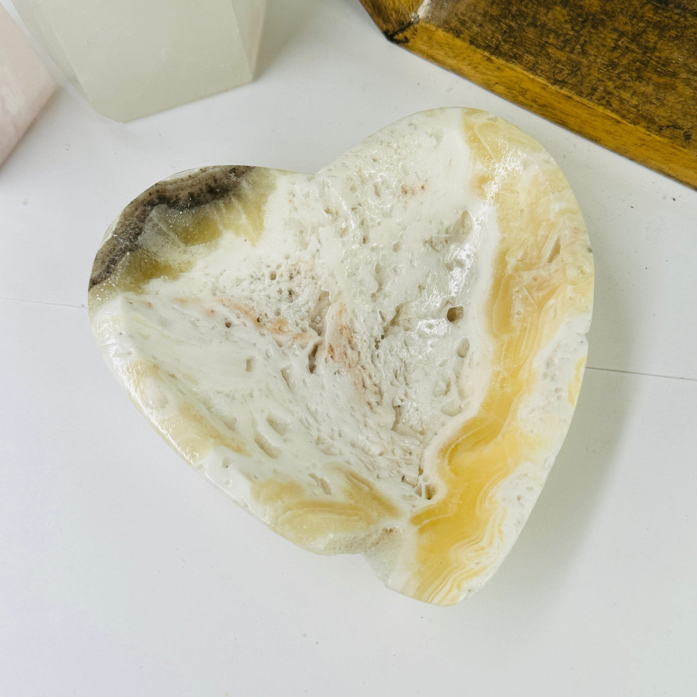 Mexican onyx bowl with decorations in the background