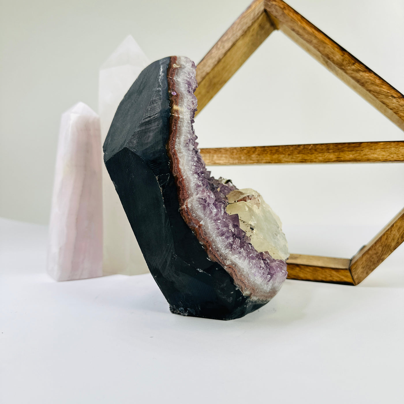 amethyst cut base with decorations in the background