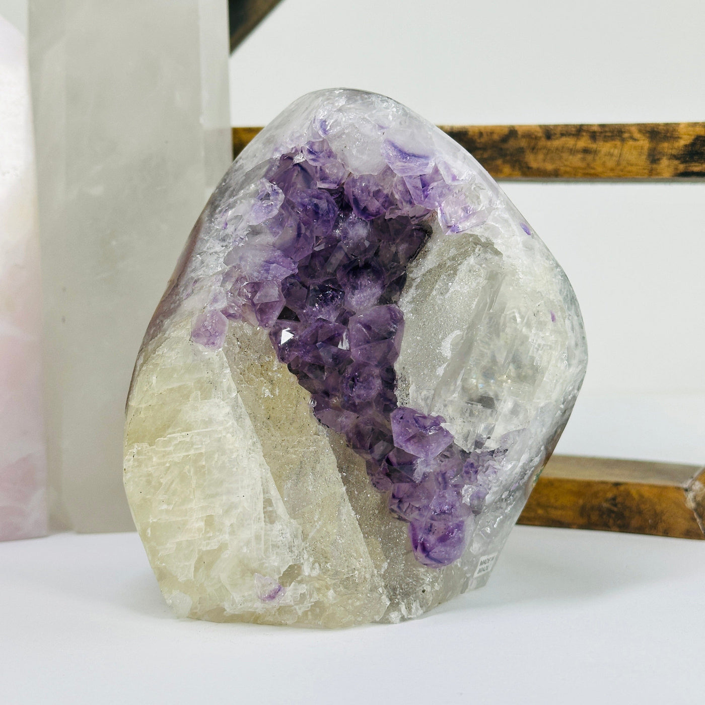 amethyst cut base with decorations in the background