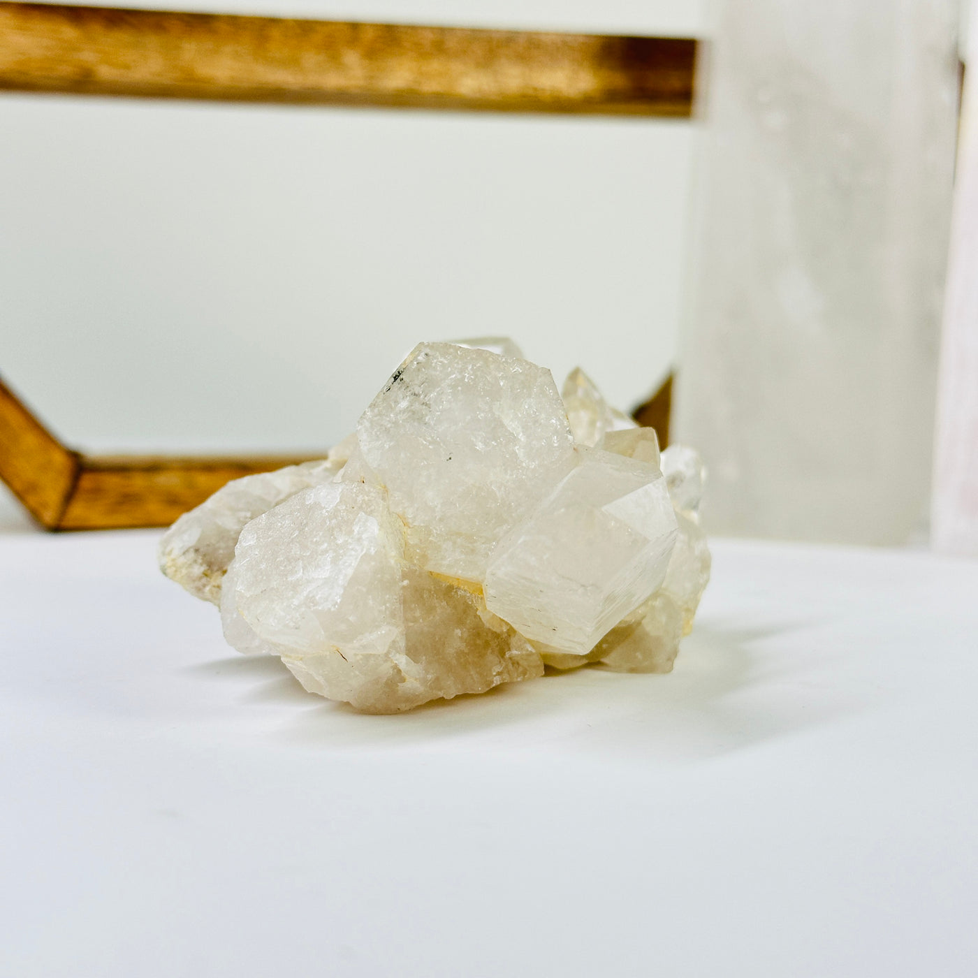 crystal quartz with decorations in the background