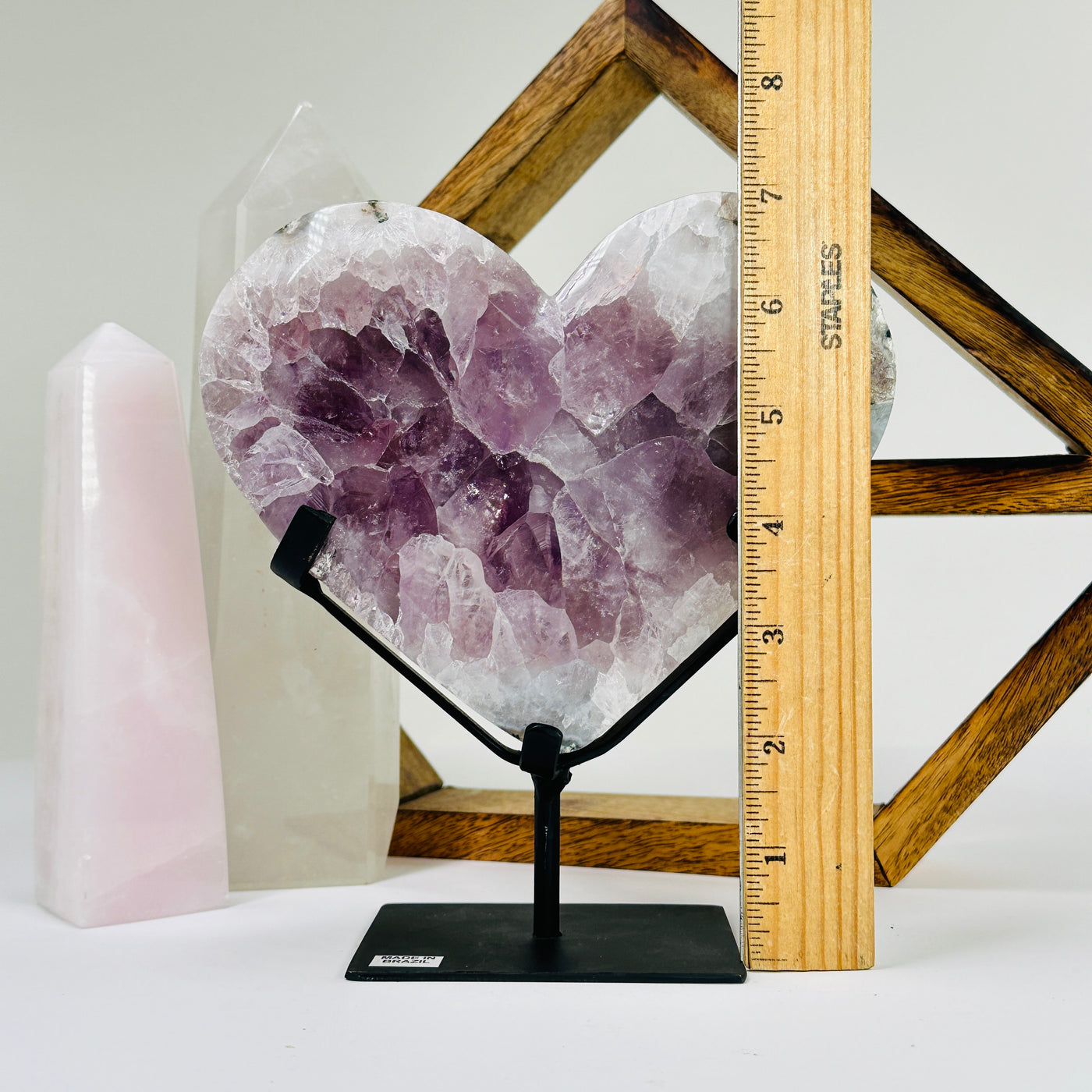 amethyst HEART next to a ruler for size reference