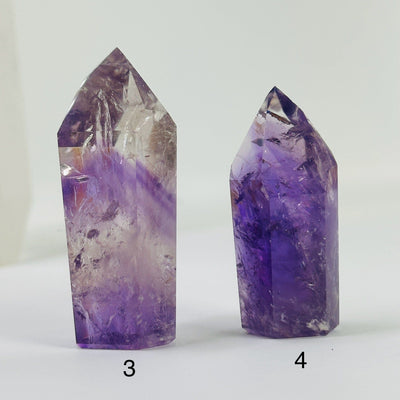 amethyst points with decorations in the background