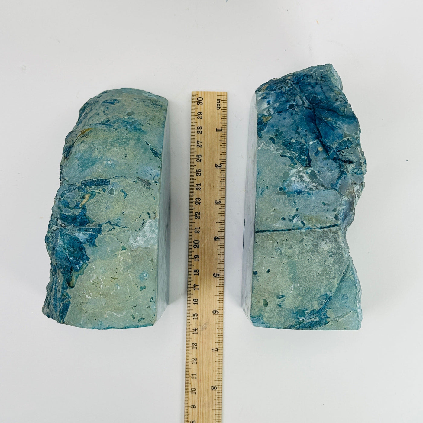 blue agate bookends next to a ruler for size reference